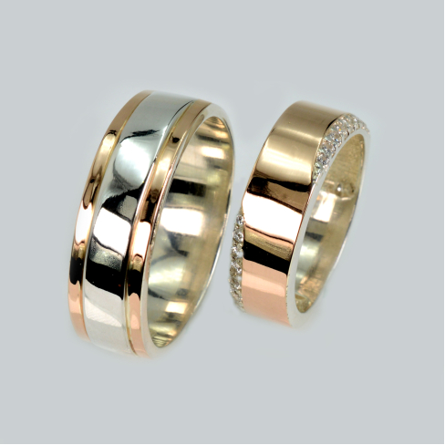 Пара обручальных колец из серебра с золотом
