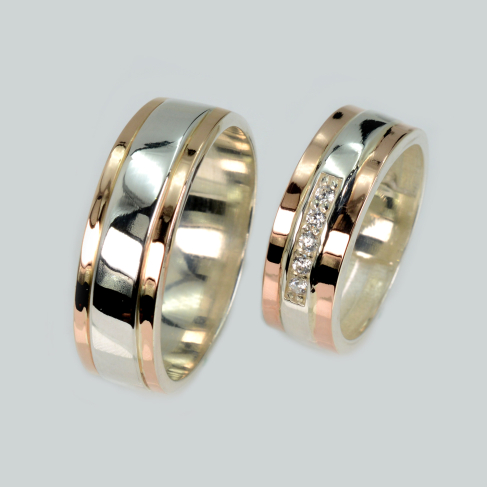 Пара обручальных колец из серебра с золотом